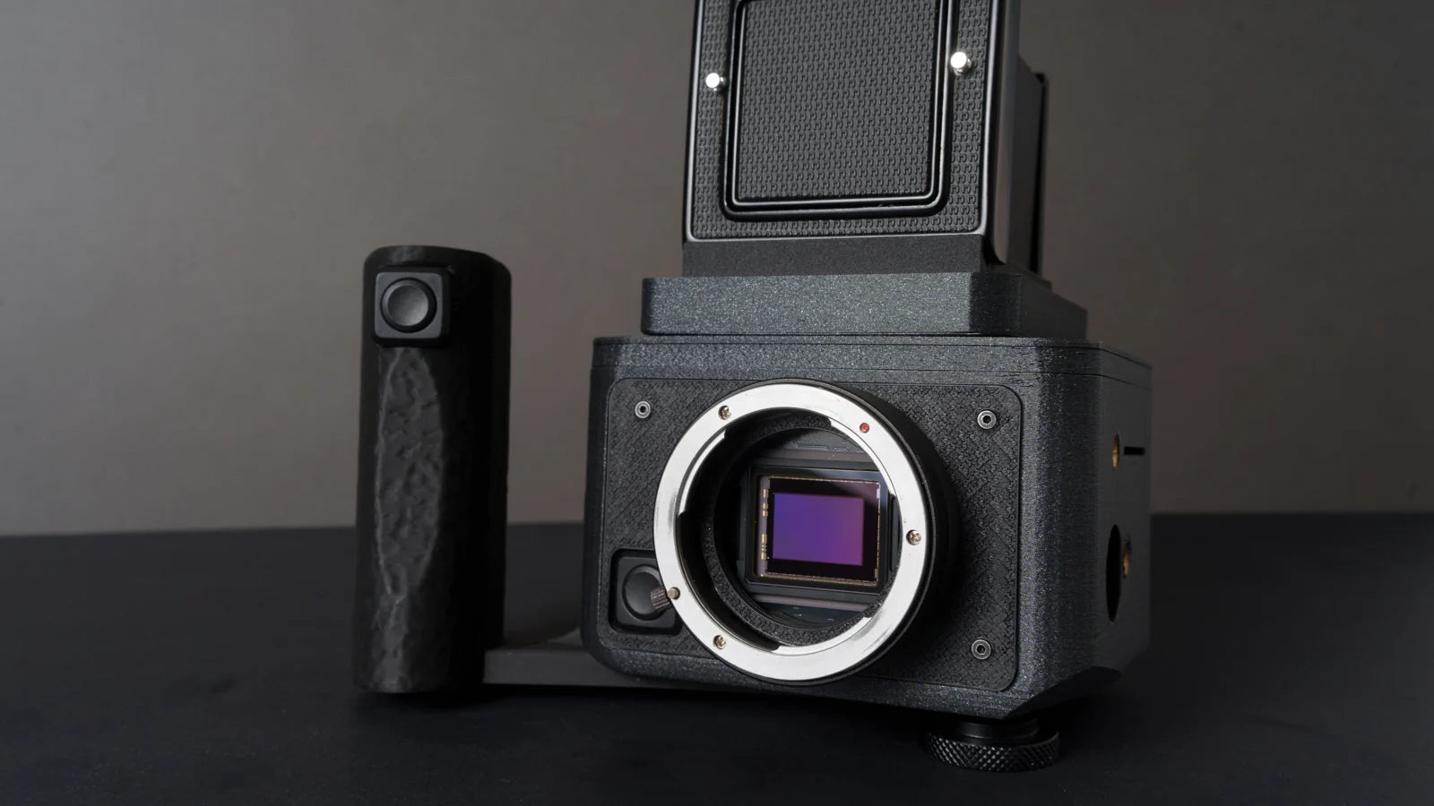 WLV-01 modular camera with exposed sensor and waist-level finder